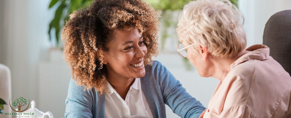 A caregiver and a client sharing a warm smile